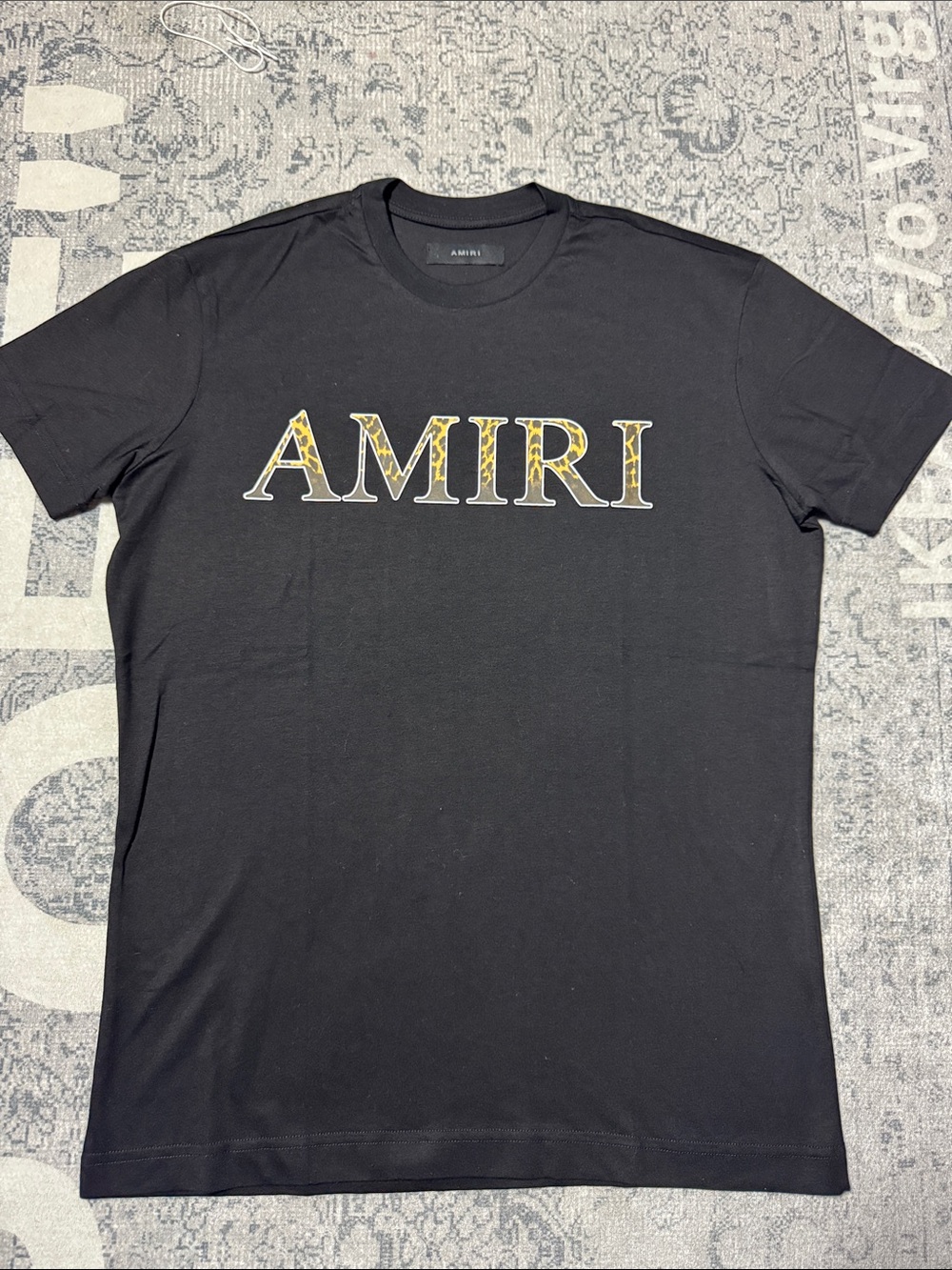 AMIRI Black Short-Sleeve Tee with Yellow Patterned Logo